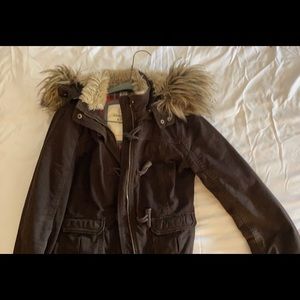 Brown jacket with fur hood